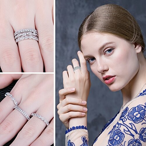 Woman wearing multiple silver rings on fingers.